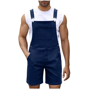Detail of dark blue denim overalls for men with metal buckles and large front pocket