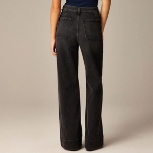 Close-up back view of high waist charcoal grey wide leg jeans with patch pockets