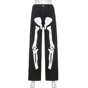 Men's black streetwear pants with white bone print and loose vintage fit