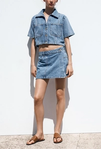 Women's light blue denim two-piece set with short-sleeve shirt and A-line mini skirt