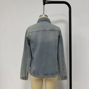 Rear view of light blue denim jacket with vintage wash and classic seam stitching detail