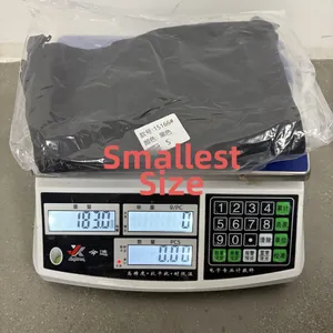 Detailed view of slim fit black denim shorts in S size packaging on a digital scale