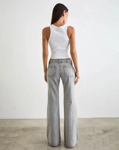 Rear view of light gray wide-leg denim jeans showing back pockets and vertical drape