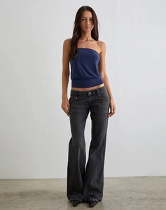 Detail view of charcoal black low waist wide leg flared jeans with washed retro texture