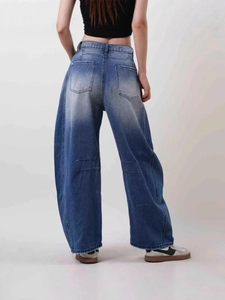 Vintage high waist wide leg blue denim pants for women with distressed wash back view