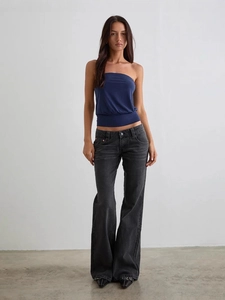 Slim fit royal blue tube top paired with flared dark grey washed denim jeans for women