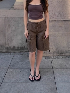 Women's dark brown cargo shorts with drawstring waist and large flap pockets