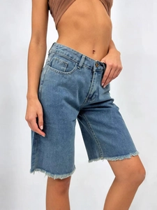 Women's vintage loose fit blue denim Bermuda shorts with raw frayed hem details