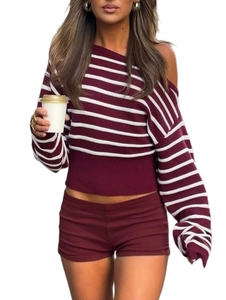 Detail of burgundy off-shoulder knit top with white stripes and matching slim fit shorts