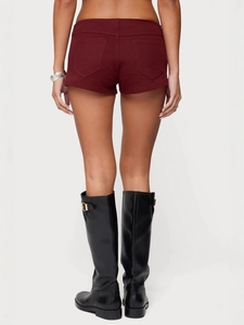 Slim fit burgundy stretch denim shorts for women with back pockets and a sleek silhouette