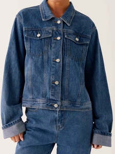 Veste en jean bleue classique pour femme avec boutons métalliques et poches poitrine décontractées