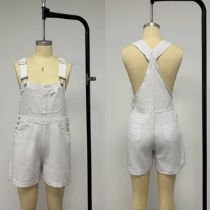 Front and back detail of white denim overalls with metal buckles and cuffed leg hems