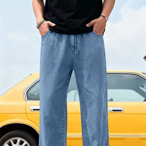 Detailed texture of light blue Tencel denim jeans with vintage washed finish