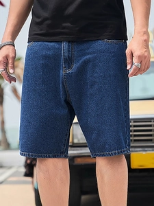 Mens dark blue denim shorts in a relaxed straight fit with contrast stitching details