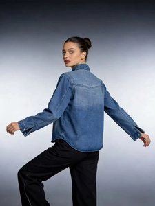 Women's blue denim shirt with relaxed fit and vintage washed finish back view
