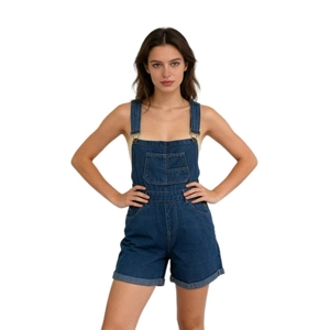 Detail of dark blue denim overalls shorts with metal buckles and chest pocket features