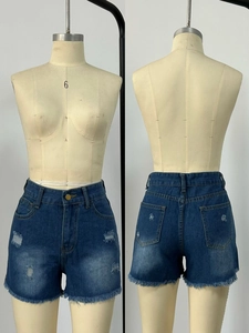Front and back detail of high-waisted distressed denim shorts with raw hem and ripped finish