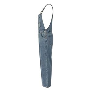 Side view of blue denim overalls showing metal buttons and adjustable straps details