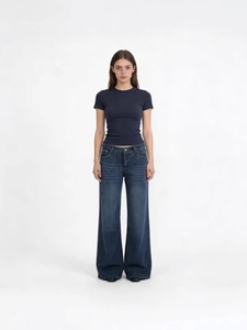 Women's dark blue slim fit t-shirt paired with retro wide-leg baggy denim jeans