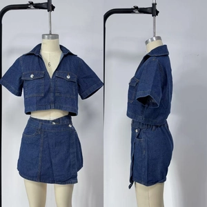 Front and side view of a dark blue denim two-piece cargo set with crop top and mini skirt