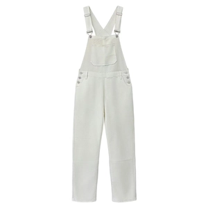 Detail view of the metal adjustable buckles and large front pocket on white denim overalls