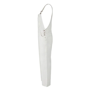 Detail of white denim overalls showing adjustable metal buckles and side button closure