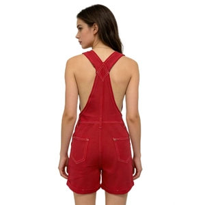 Detailed back view of red denim overalls featuring white contrast stitching and Y-back design