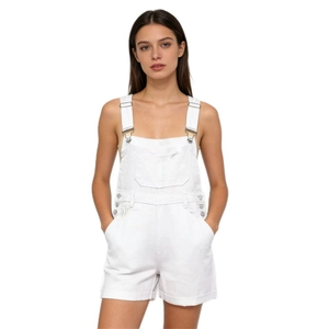 Front detail of white denim overalls featuring chest pocket and metal button buckles