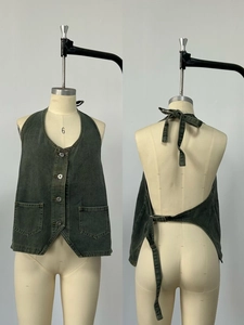 Detailed views of vintage grey halter denim vest with four buttons and open back tie