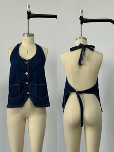 Front and back detail of dark blue denim halter vest with button closure and tie-up back