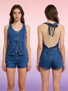 Detail of dark blue denim vest set showing the open back design and halter neck bow