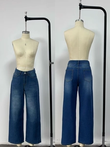 Front and back views of high waist wide leg blue denim jeans with washed finish