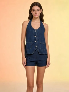 Women's dark blue denim two-piece set featuring a halter button vest and matching shorts