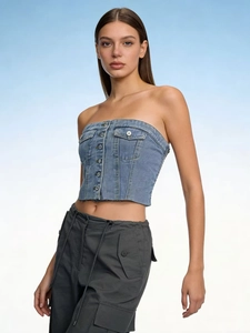 Detail of blue denim tube top with button-up front and vintage flap chest pockets