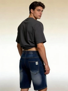 Men's casual outfit with dark grey t-shirt and blue elastic waist denim shorts