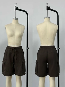 Detailed back and front view of dark brown cargo shorts with elastic drawstring waist