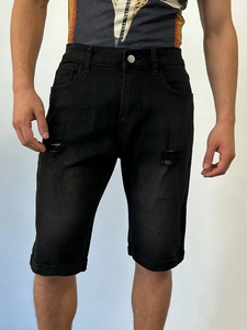 Men's casual black denim shorts with ripped holes and rolled hem in a relaxed fit
