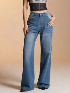 High-waist blue wide-leg denim jeans with relaxed fit and vintage washed whiskers
