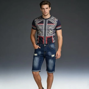 Detail of distressed denim shorts with ripped holes and rolled hems for men