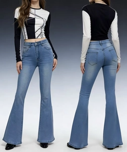 Detail view of high waist light blue flare jeans with classic five-pocket construction