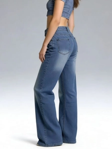 Women's mid-blue slim denim vest and high-waist wide-leg jeans set from rear side view