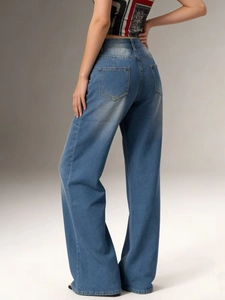 Detailed back view of high waisted wide leg jeans showing retro wash and dual back pockets