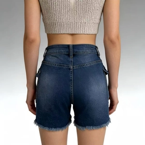 Rear view of high-waisted denim shorts with frayed hems and side cargo pockets