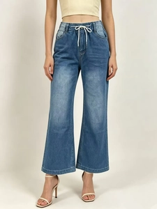 Jean femme taille haute à jambes larges avec cordon de serrage élastique et denim délavé
