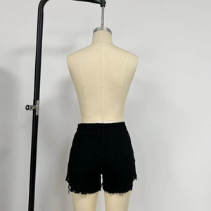 Detailed back view of high-waisted black denim shorts with frayed hems and back pockets