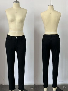 Detail view showing front and back of black slim fit stretch denim jeans for women