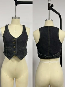 Front and back detail of slim black denim vest with gold topstitching and metal buttons