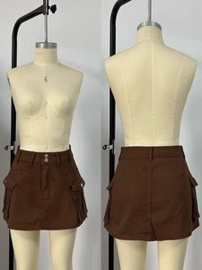 Detailed views showing cargo pockets and high-waist double button design on denim skirt