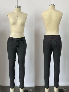 Detailed front and back view of dark grey slim fit stretch denim jeans for women