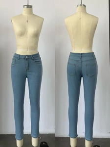 Detailed front and back view of slim fit light blue denim jeans with classic pockets